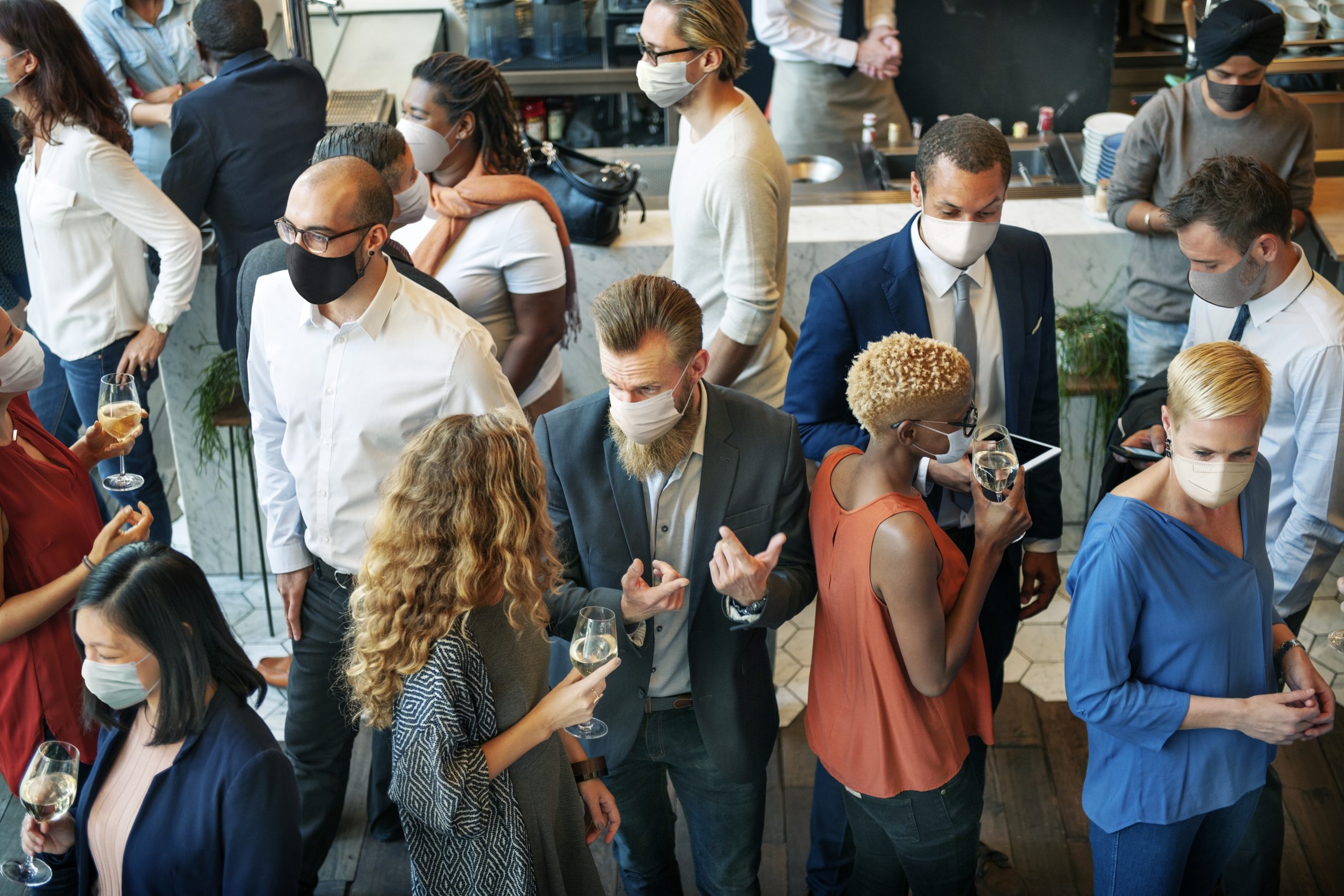 Diverse startup business people with masks in the new normal business people
